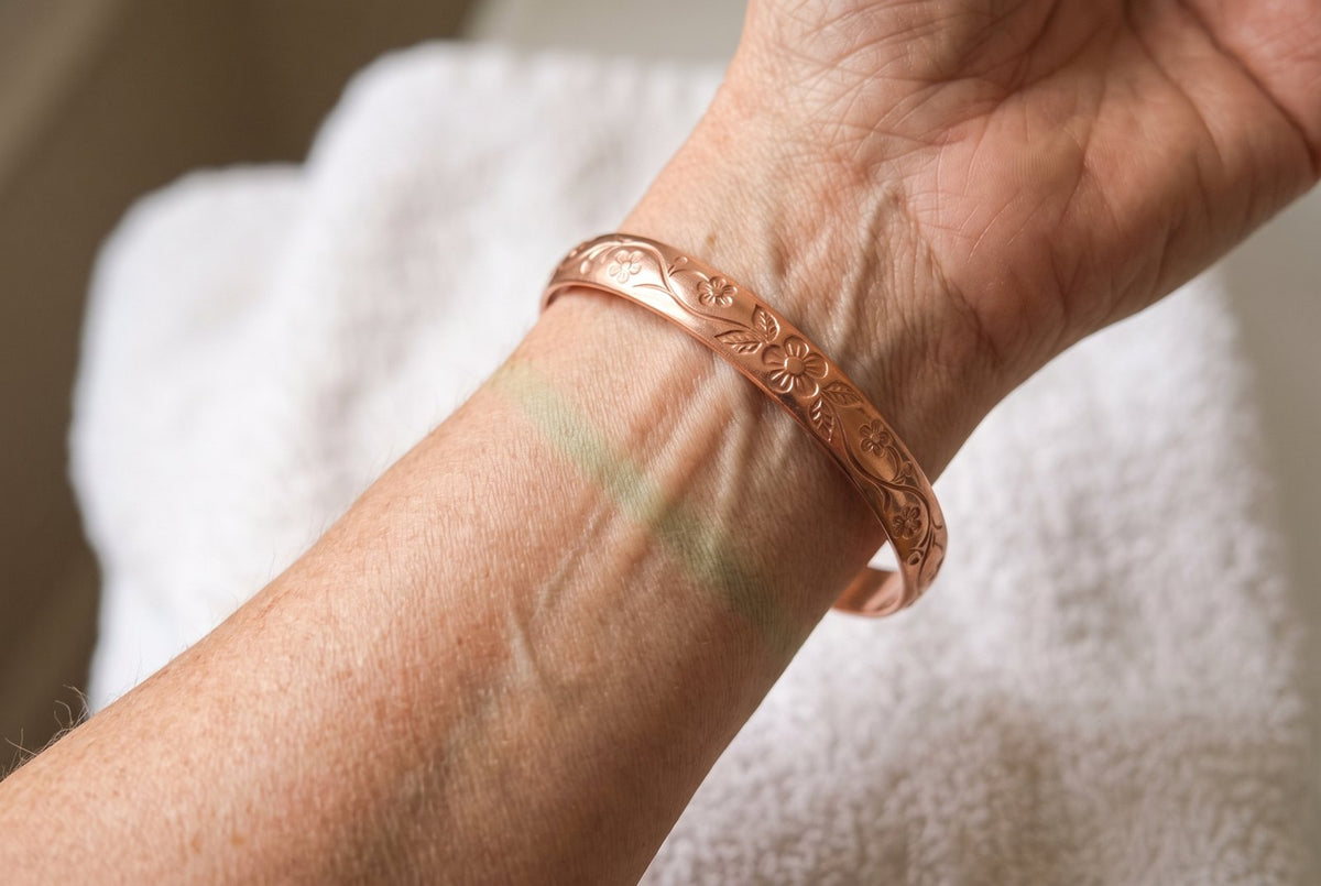 The faint green ring solid copper leaves on the wrist