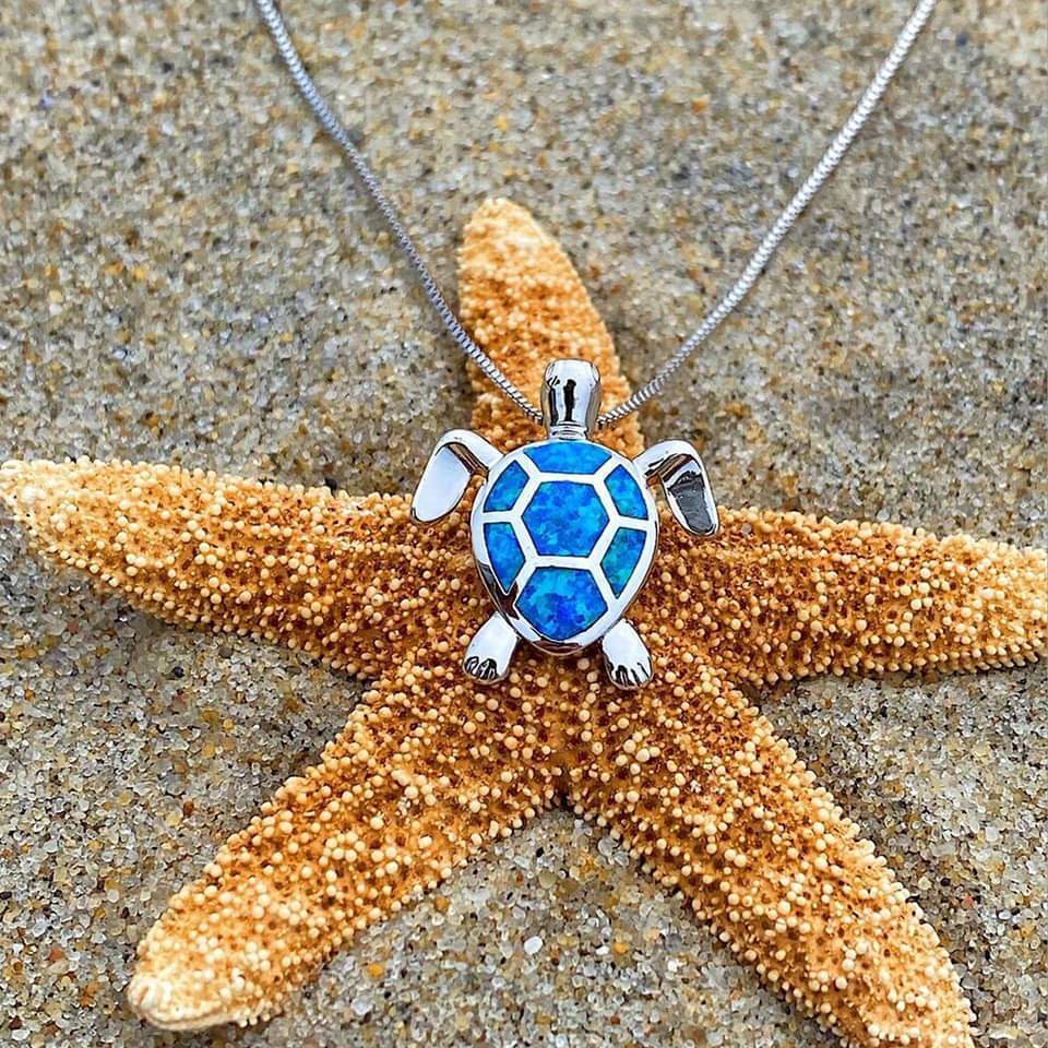 Set of necklace and earrings with opal sea turtles
