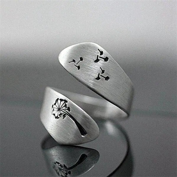 Adjustable hand-carved dandelion ring