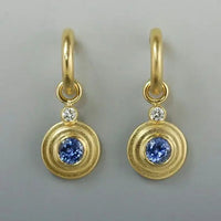 Gold-plated vintage earrings with blue zirconia inlay