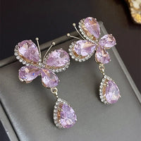 Elegant pink daisy earrings