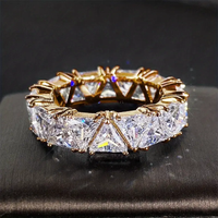 Golden ring with crystals